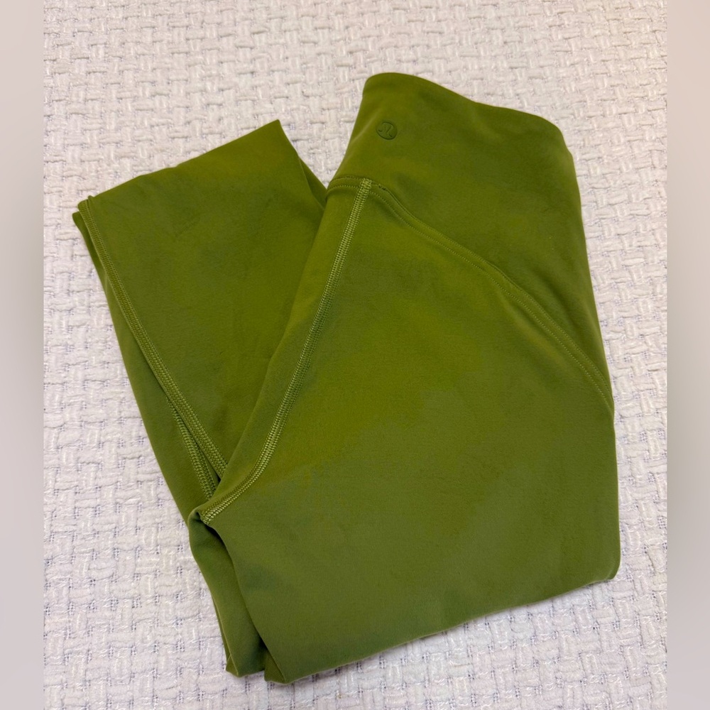 Lululemon green high-waisted leggings, women’s size 4. Great condition!